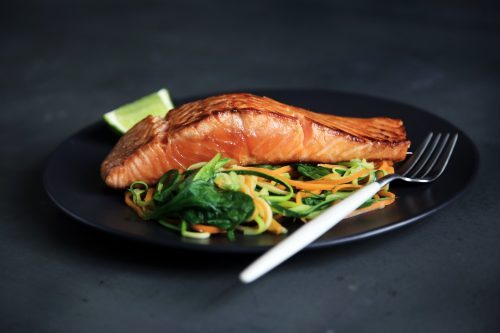 Driven by exports of farmed salmon, the Faroese economy has flourished in recent years, growing nearly 7 percent in 2016. Photo by Caroline Attwood on Unsplash